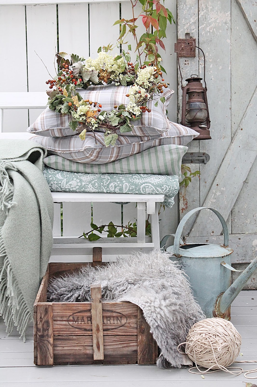 Bench-Like Chair and Patterned Cushions